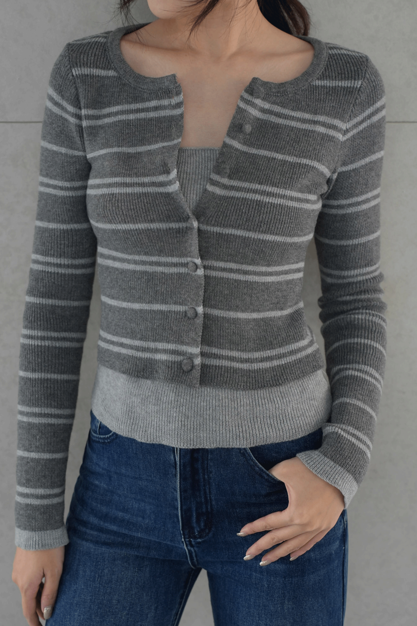 假兩件排釦條紋針織上衣