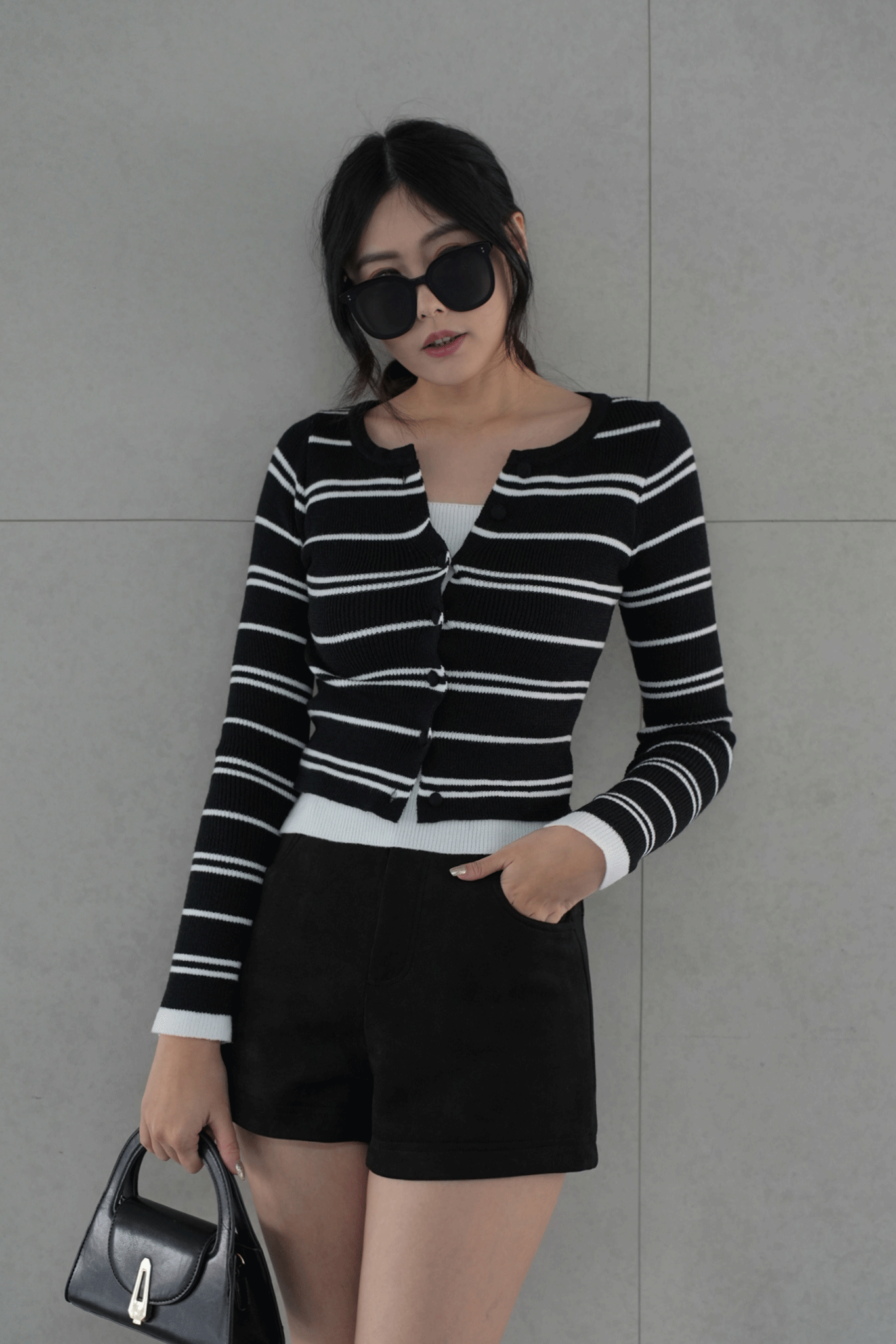 假兩件排釦條紋針織上衣